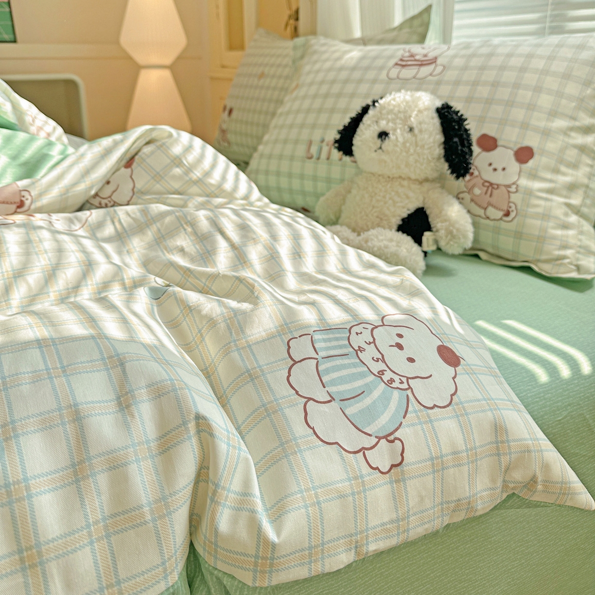 91家纺网 家纺一手货源 找家纺 春雨家居 2026新款全棉印花ins减龄可爱小清新单被套 格子布丁狗