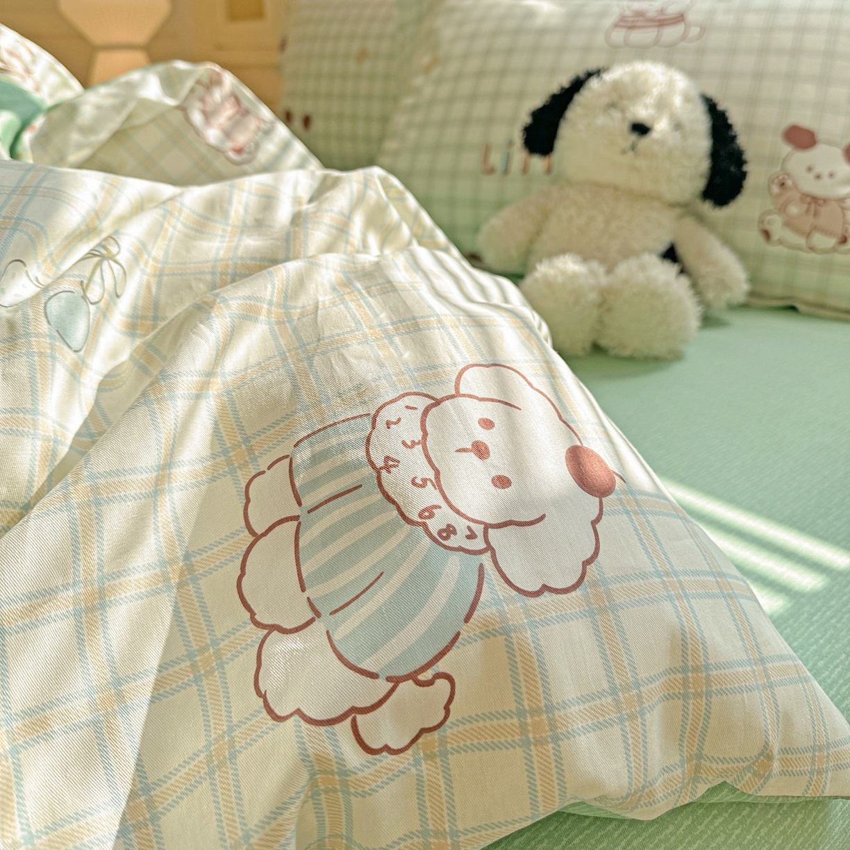 91家纺网 家纺一手货源 找家纺 春雨家居 2026新款全棉印花ins减龄可爱小清新单被套 格子布丁狗