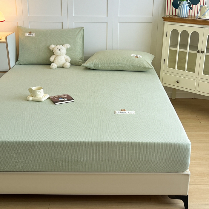 91家纺网 家纺一手货源 找家纺 佳笠家居 2026年新款kimi熊a类全棉色织水洗棉大尺寸单床笠 果绿小条