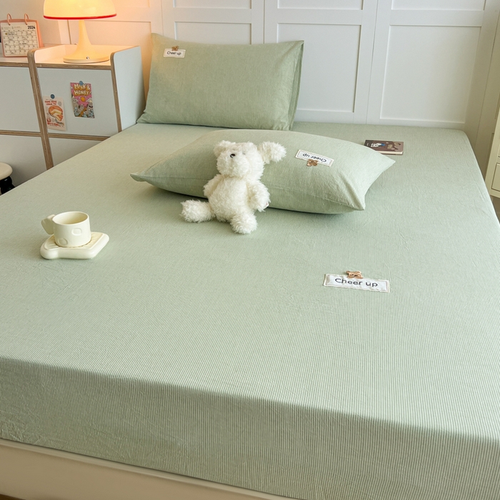 91家纺网 家纺一手货源 找家纺 佳笠家居 2026年新款kimi熊a类全棉色织水洗棉大尺寸单床笠 果绿小条