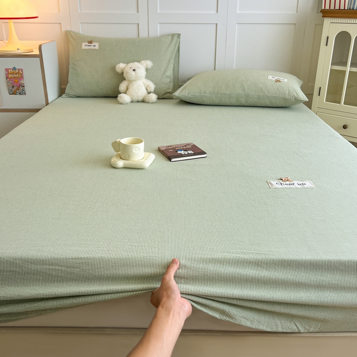 91家纺网 家纺一手货源 找家纺 佳笠家居 2026年新款kimi熊a类全棉色织水洗棉大尺寸单床笠 果绿小条