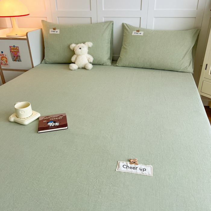 91家纺网 家纺一手货源 找家纺 佳笠家居 2026年新款kimi熊a类全棉色织水洗棉大尺寸单床笠 果绿小条