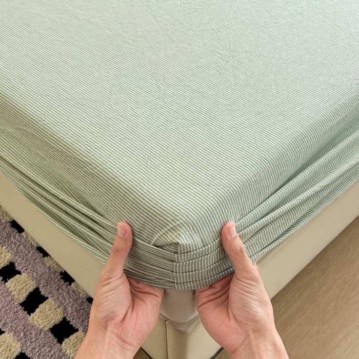 91家纺网 家纺一手货源 找家纺 佳笠家居 2026年新款kimi熊a类全棉色织水洗棉大尺寸单床笠 果绿小条