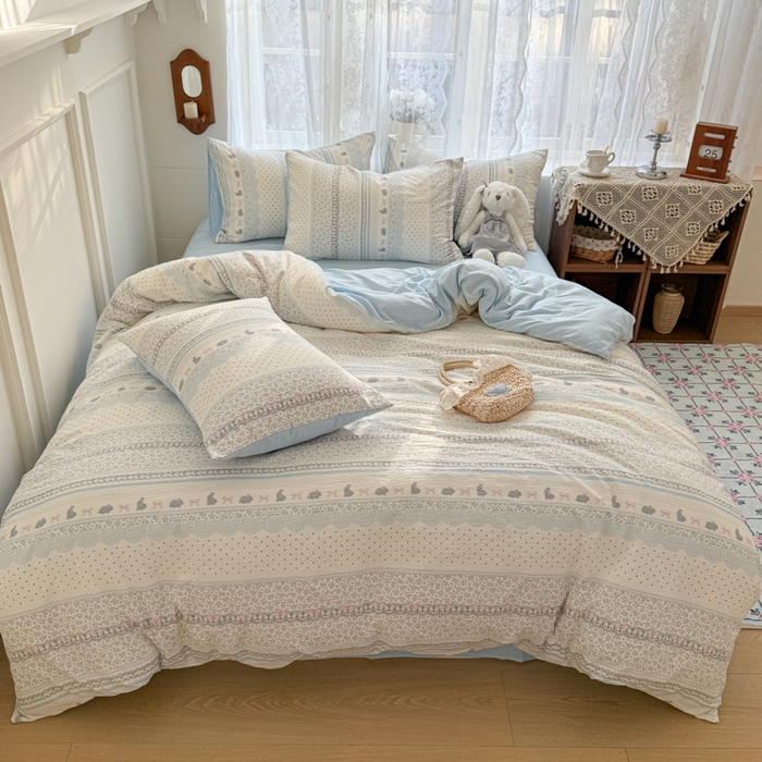 91家纺网 家纺一手货源 找家纺 妖妖家纺 2026新款敲可爱的奶呼呼云感双层纱简约四件套系列 小兔啵啵花