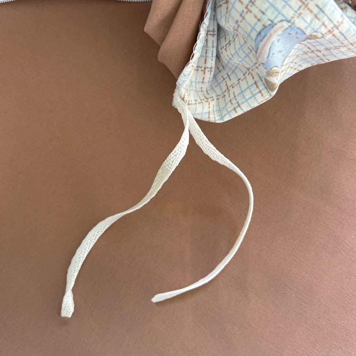 91家纺网 家纺一手货源 找家纺 弗苓家纺 2026新款古法水洗仿棉云感纱四件套小布袋 时光里