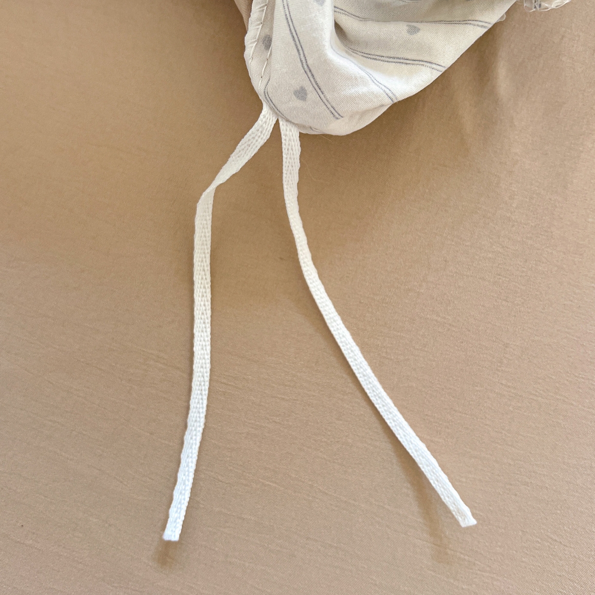 91家纺网 家纺一手货源 找家纺 弗苓家纺 2026新款古法水洗仿棉云感纱四件套小布袋 条纹木马