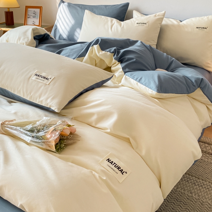 91家纺网 家纺一手货源 找家纺 昊翔家纺 2025新款13372全棉纯色四件套无印良品风简约套件 奶白-深蓝