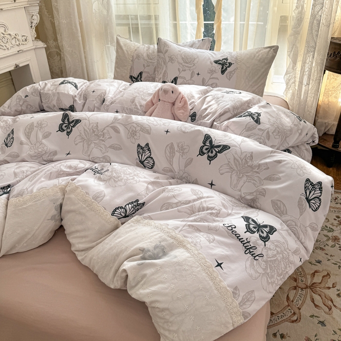 91家纺网 家纺一手货源 找家纺 温眠家纺 2025新款ins风小清新镂空花边水洗云朵棉四件套-风格一 蝶恋花