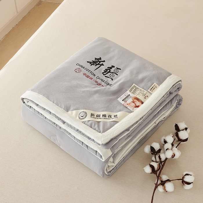 91家纺网 家纺一手货源 找家纺 温眠家纺 2025新款水洗棉新疆棉花被 双面灰