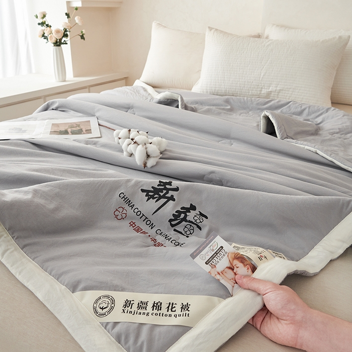 91家纺网 家纺一手货源 找家纺 温眠家纺 2025新款水洗棉新疆棉花被 双面灰