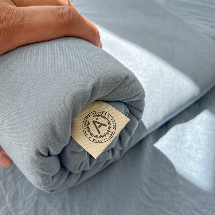 91家纺网 家纺一手货源 找家纺 温眠家纺 2025新款水洗棉色织单床单系列-单枕套 迷雾蓝