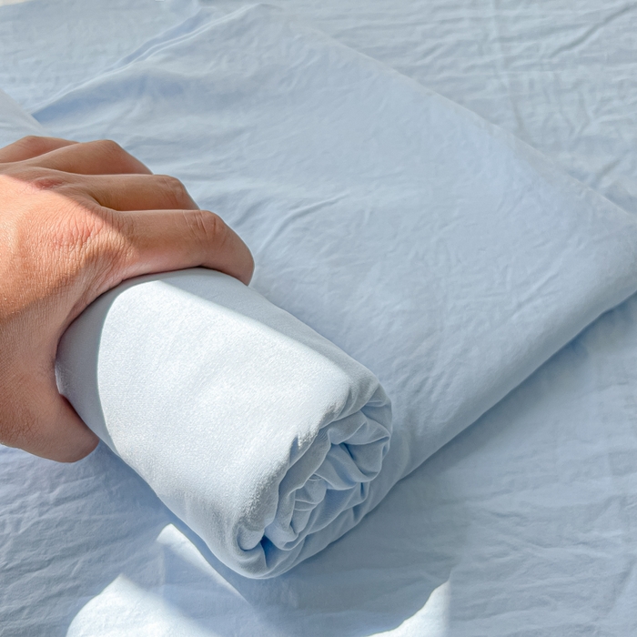 91家纺网 家纺一手货源 找家纺 温眠家纺 2025新款水洗棉色织单床单系列-单枕套 奶蓝