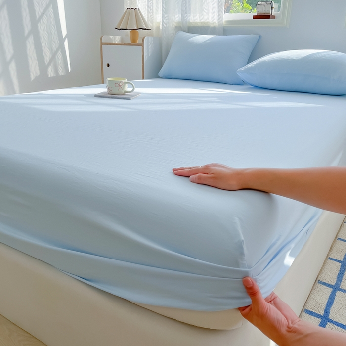 91家纺网 家纺一手货源 找家纺 温眠家纺 2025新款纯色格子高克重水洗棉床笠全包围防滑床罩保护套单床笠 奶兰