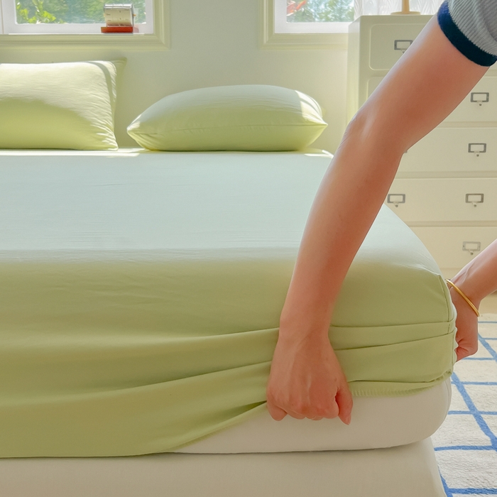 91家纺网 家纺一手货源 找家纺 温眠家纺 2025新款纯色格子高克重水洗棉床笠全包围防滑床罩保护套单床笠 豆绿