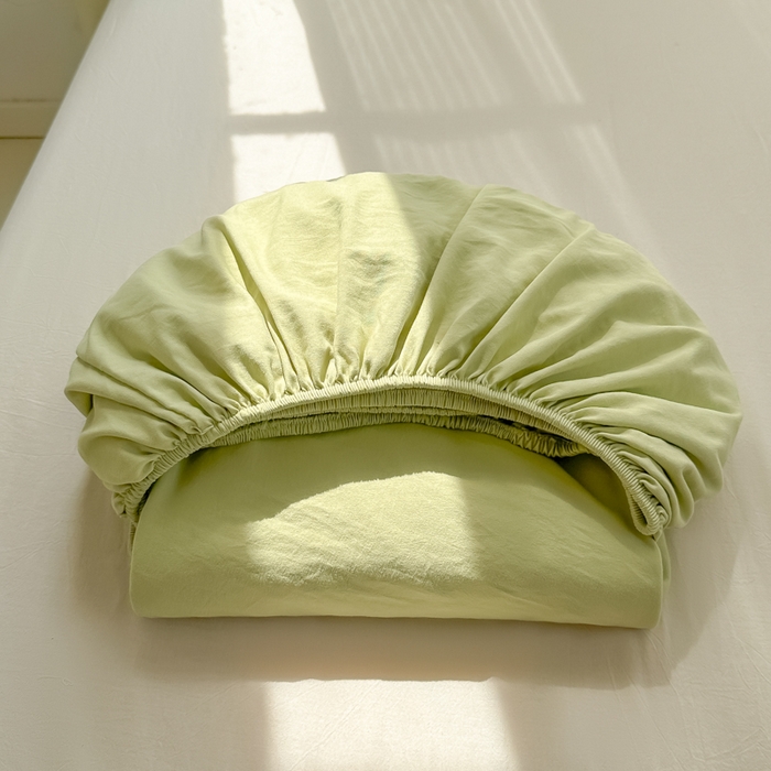 91家纺网 家纺一手货源 找家纺 温眠家纺 2025新款纯色格子高克重水洗棉床笠全包围防滑床罩保护套单床笠 豆绿