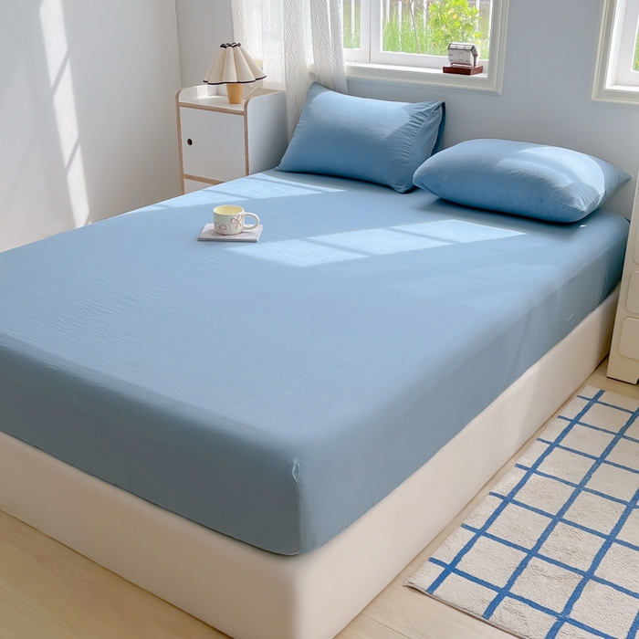 91家纺网 家纺一手货源 找家纺 温眠家纺 2025新款纯色格子高克重水洗棉床笠全包围防滑床罩保护套单床笠 迷雾蓝