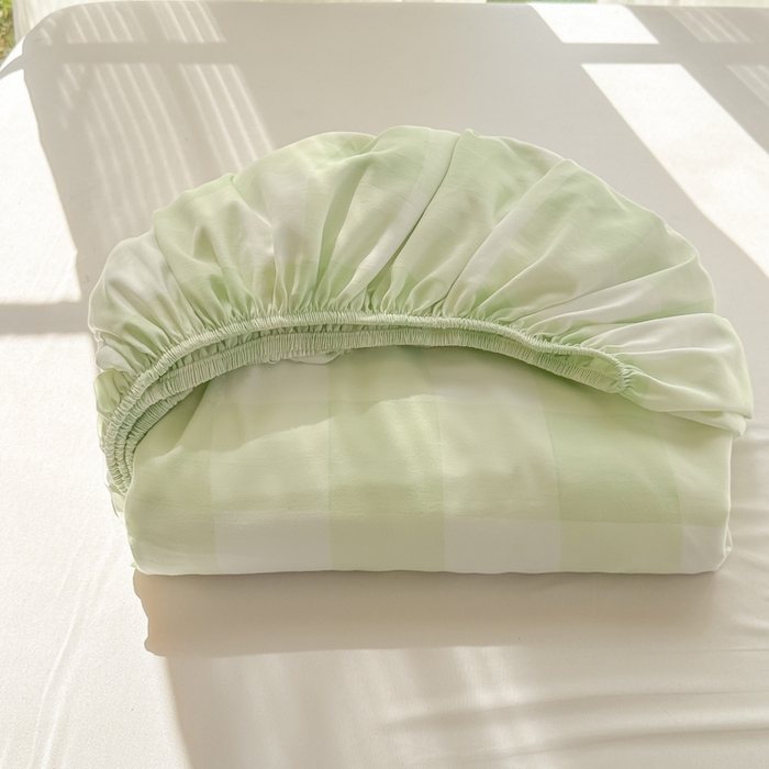 91家纺网 家纺一手货源 找家纺 温眠家纺 2025新款纯色格子高克重水洗棉床笠全包围防滑床罩保护套单床笠 茉莉青提