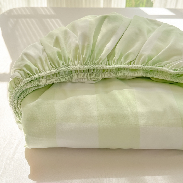 91家纺网 家纺一手货源 找家纺 温眠家纺 2025新款纯色格子高克重水洗棉床笠全包围防滑床罩保护套单床笠 茉莉青提