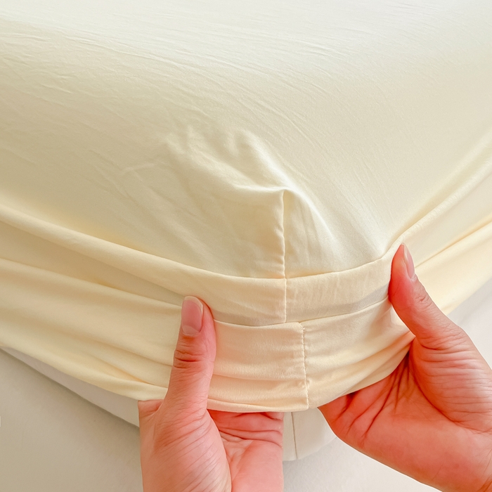 91家纺网 家纺一手货源 找家纺 温眠家纺 2025新款纯色格子高克重水洗棉床笠全包围防滑床罩保护套单床笠 奶黄