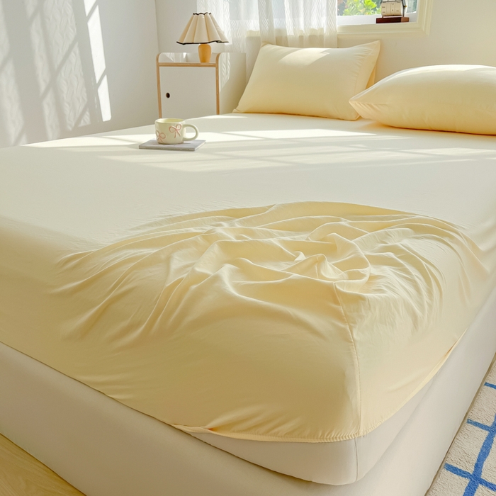 91家纺网 家纺一手货源 找家纺 温眠家纺 2025新款纯色格子高克重水洗棉床笠全包围防滑床罩保护套单床笠 奶黄