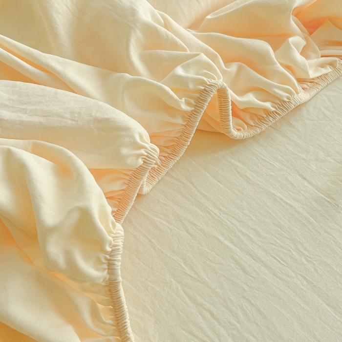 91家纺网 家纺一手货源 找家纺 温眠家纺 2025新款纯色格子高克重水洗棉床笠全包围防滑床罩保护套单床笠 奶黄