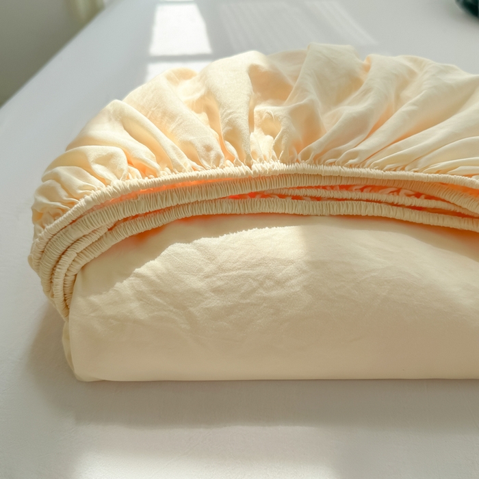 91家纺网 家纺一手货源 找家纺 温眠家纺 2025新款纯色格子高克重水洗棉床笠全包围防滑床罩保护套单床笠 奶黄