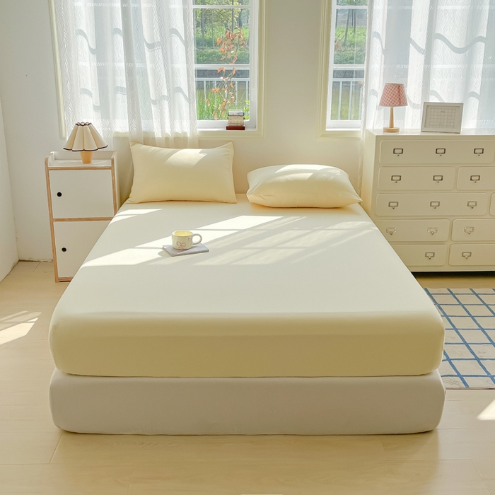 91家纺网 家纺一手货源 找家纺 温眠家纺 2025新款纯色格子高克重水洗棉床笠全包围防滑床罩保护套单床笠 奶黄