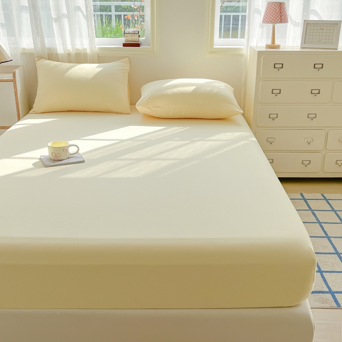 91家纺网 家纺一手货源 找家纺 温眠家纺 2025新款纯色格子高克重水洗棉床笠全包围防滑床罩保护套单床笠 奶黄