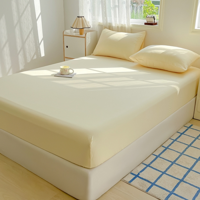 91家纺网 家纺一手货源 找家纺 温眠家纺 2025新款纯色格子高克重水洗棉床笠全包围防滑床罩保护套单床笠 奶黄