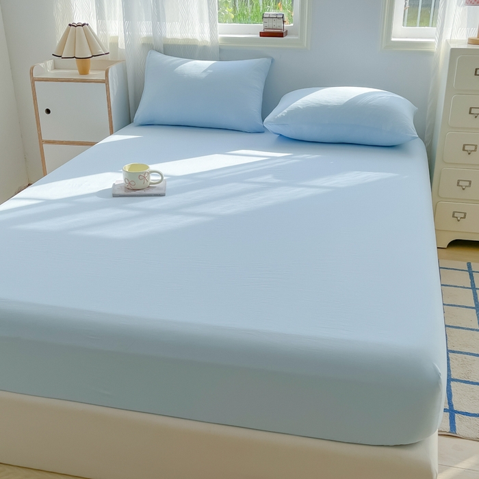 91家纺网 家纺一手货源 找家纺 温眠家纺 2025新款纯色格子高克重水洗棉床笠全包围防滑床罩保护套单床笠 奶兰