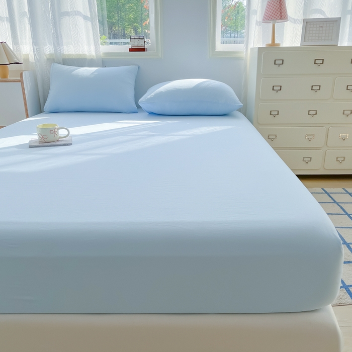 91家纺网 家纺一手货源 找家纺 温眠家纺 2025新款纯色格子高克重水洗棉床笠全包围防滑床罩保护套单床笠 奶兰