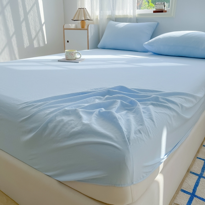 91家纺网 家纺一手货源 找家纺 温眠家纺 2025新款纯色格子高克重水洗棉床笠全包围防滑床罩保护套单床笠 奶兰