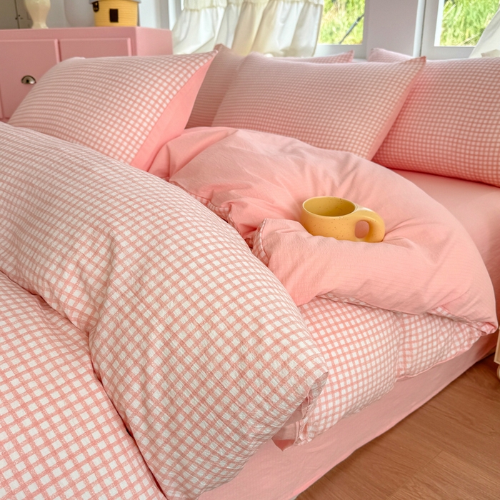 91家纺网 家纺一手货源 找家纺 温眠家纺 2025新款云感针织双层纱四件套 粉小格