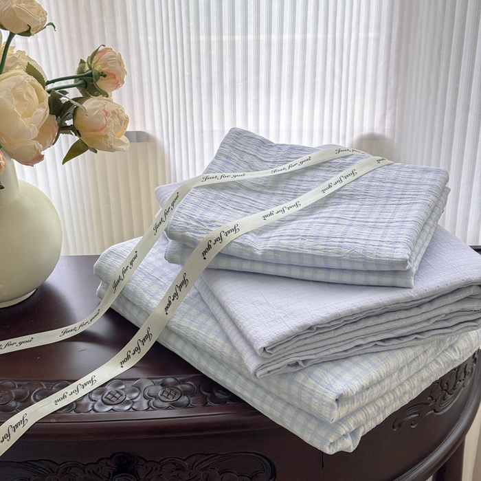 91家纺网 家纺一手货源 找家纺 温眠家纺 2025新款云感针织双层纱四件套 蓝小格