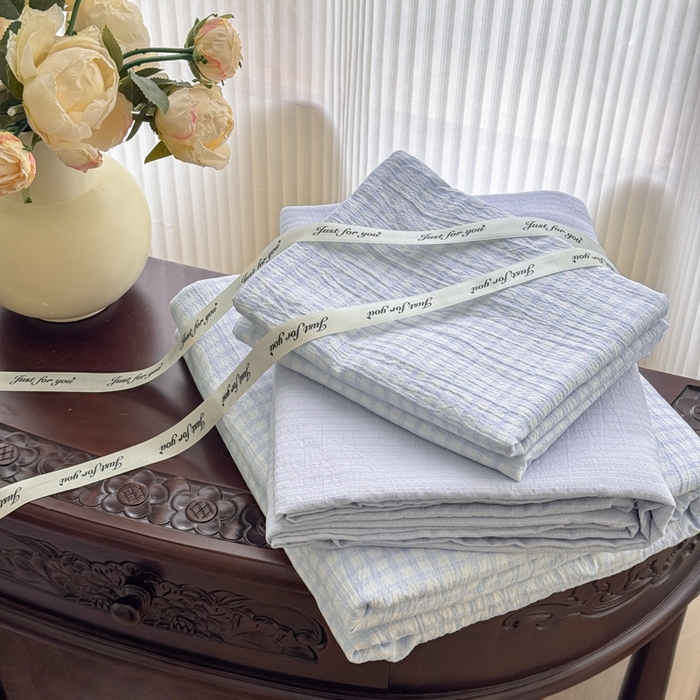 91家纺网 家纺一手货源 找家纺 温眠家纺 2025新款活性印染云感针织双层纱四件套 蓝小格