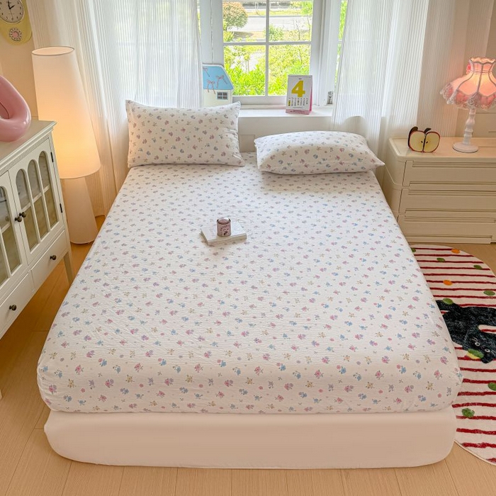 91家纺网 家纺一手货源 找家纺 温眠家纺 2025春夏新款云感棉双层纱床笠单床笠枕套三件套 铃兰春信