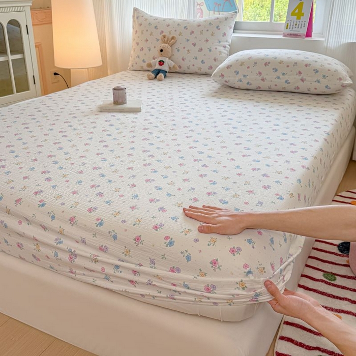 91家纺网 家纺一手货源 找家纺 温眠家纺 2025春夏新款云感棉双层纱床笠单床笠枕套三件套 铃兰春信