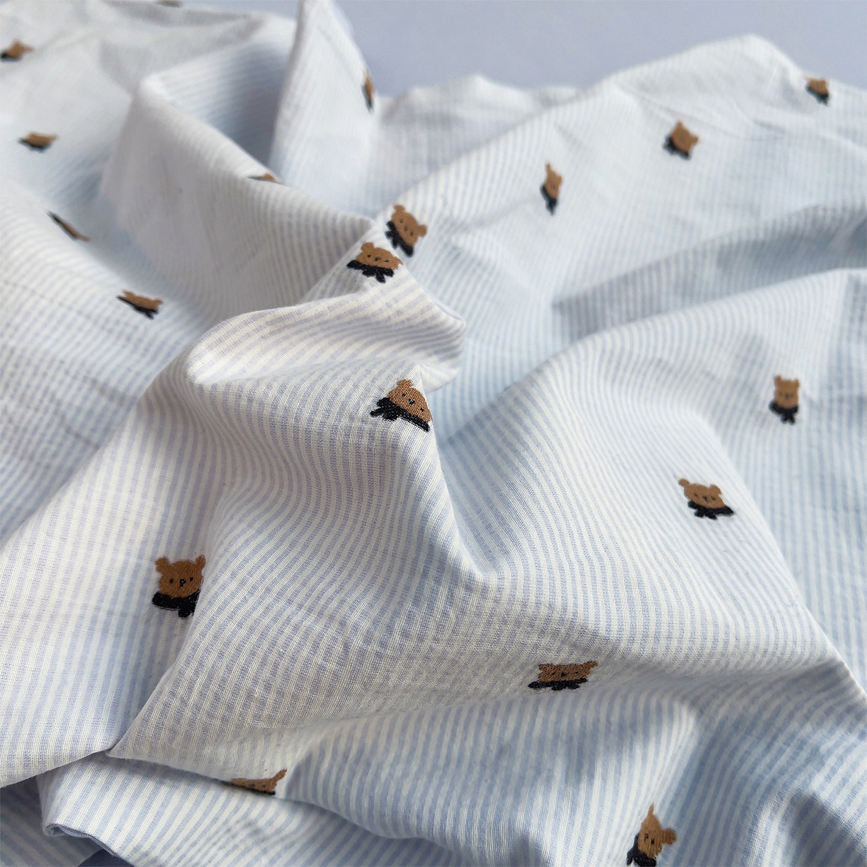 91家纺网 家纺一手货源 找家纺 炫拼家纺 2026新款A类全棉60支色织提花剪花B版40支水洗棉四件套-米熊系列 米熊一星辰蓝