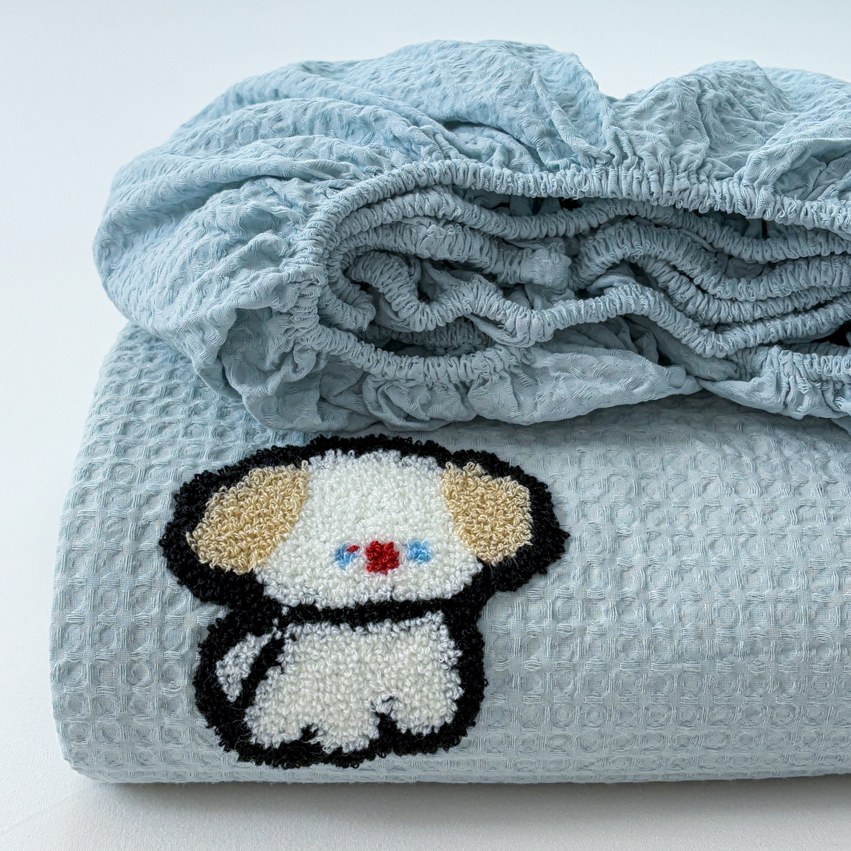 91家纺网 家纺一手货源 找家纺 居眠 2026新款全棉华夫格毛巾绣系列床笠 毛绒小狗-蓝