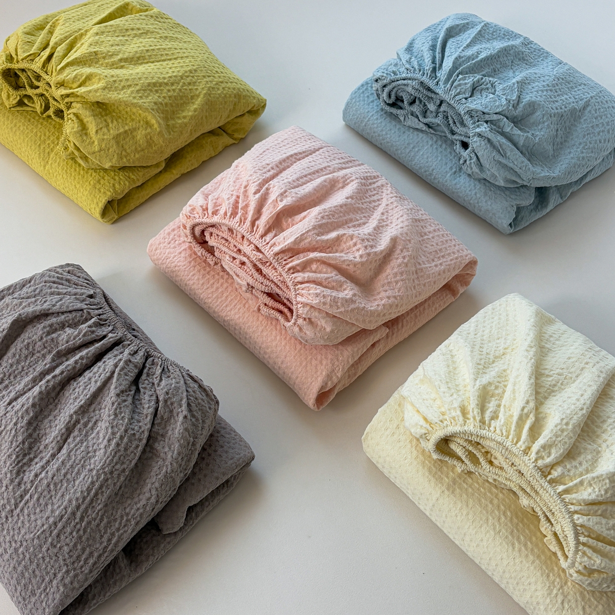 91家纺网 家纺一手货源 找家纺 居眠 2026新款全棉华夫格毛巾绣系列床笠 组合叠拍