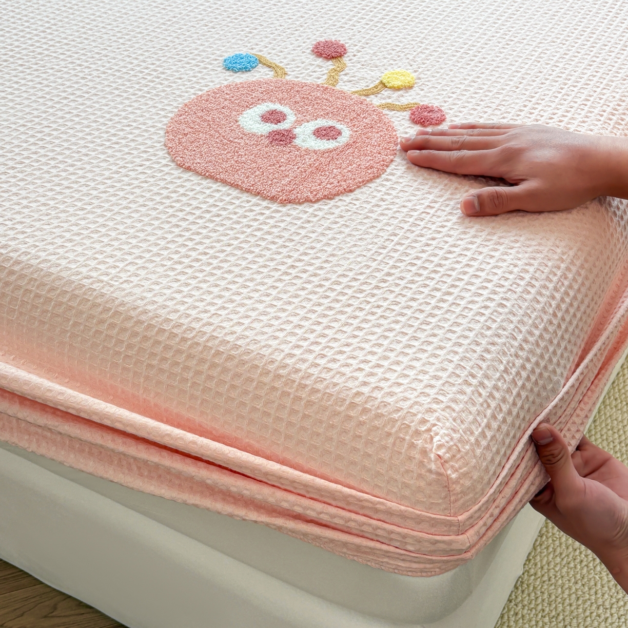 91家纺网 家纺一手货源 找家纺 居眠 2026新款全棉华夫格毛巾绣系列枕套 萌宠-粉