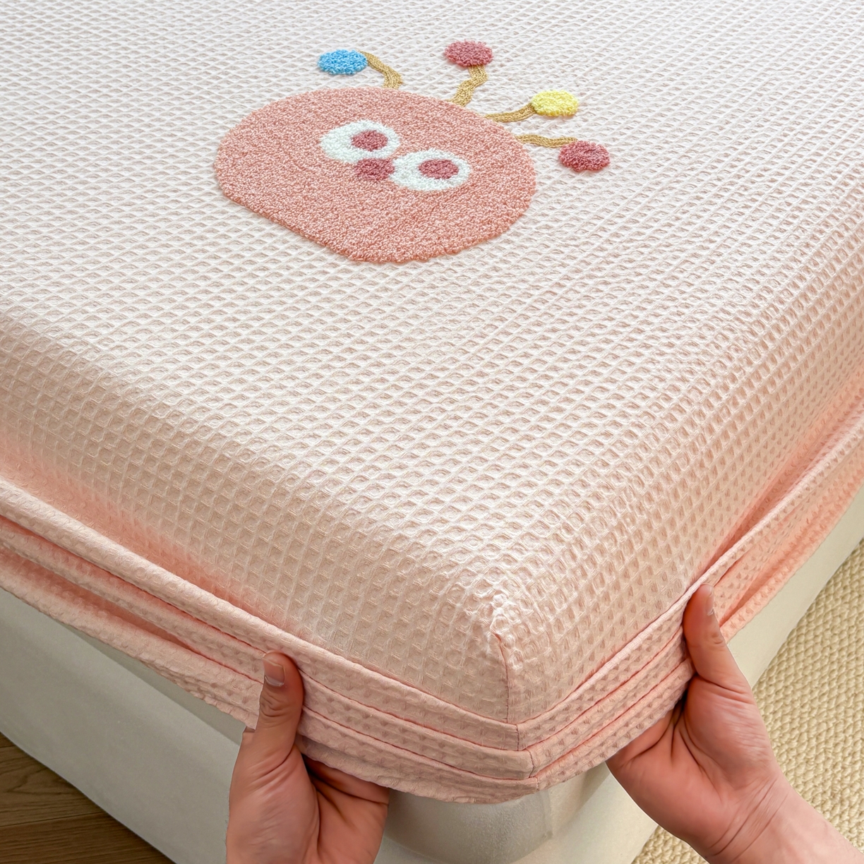 91家纺网 家纺一手货源 找家纺 居眠 2026新款全棉华夫格毛巾绣系列枕套 萌宠-粉