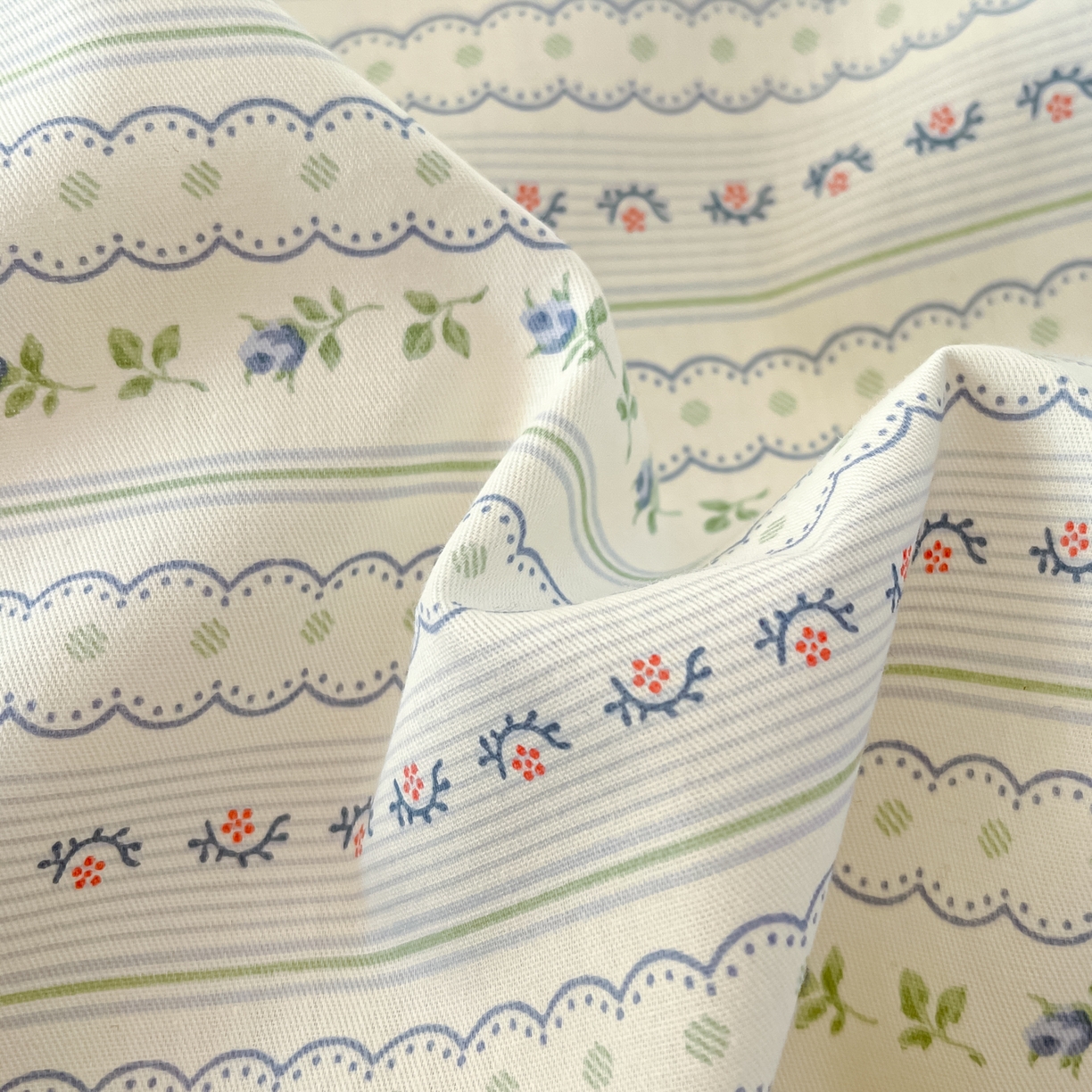 91家纺网 家纺一手货源 找家纺 瑞莱 2026新款全棉印花13070花卉系列四件套 波尔卡