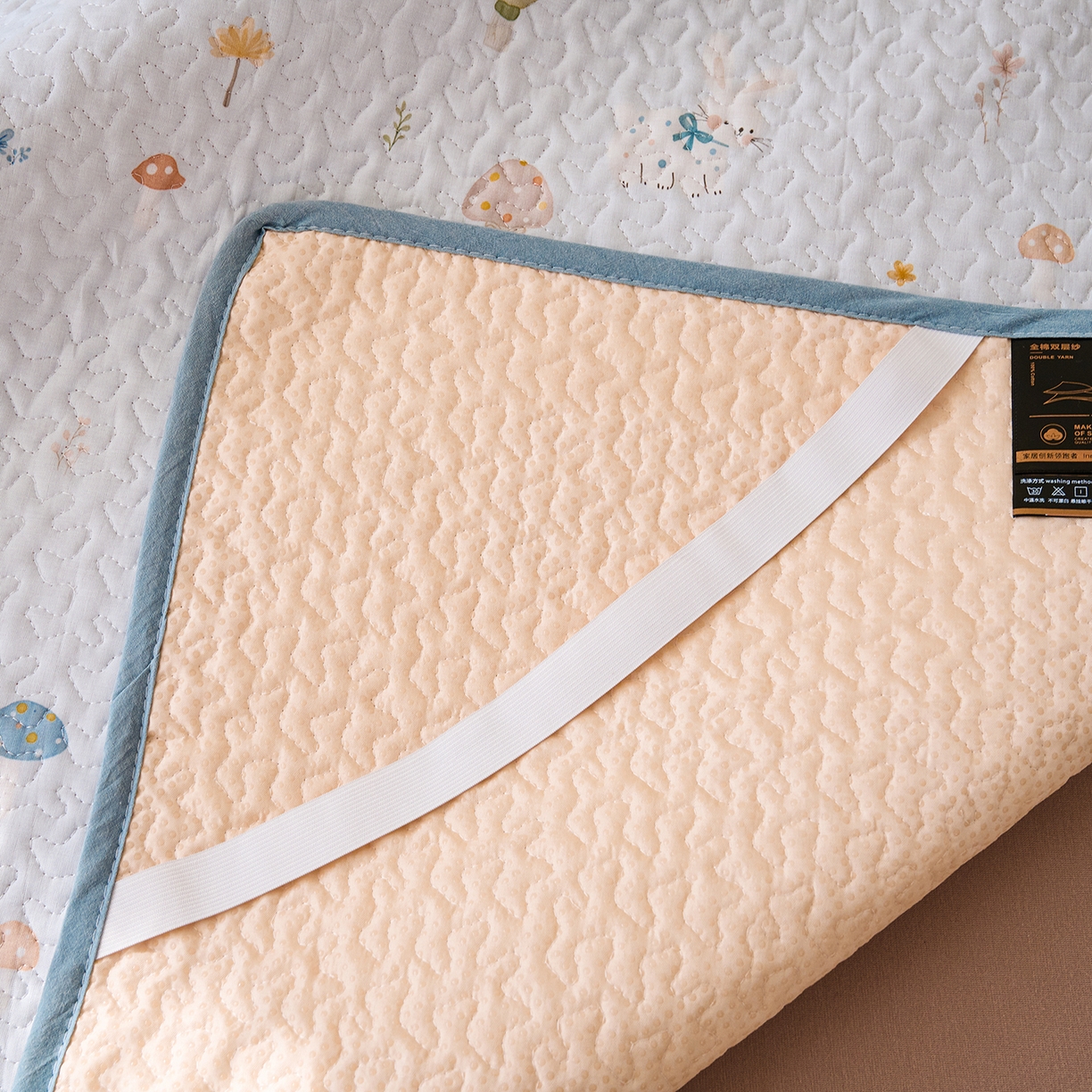 91家纺网 家纺一手货源 找家纺 拾小柒 2026年新款全棉双层纱床护垫纯棉防滑床盖床褥子软床垫 萌趣森林蓝