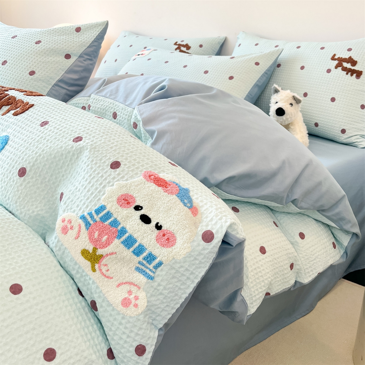 91家纺网 家纺一手货源 找家纺 笙意家纺 2026新款全棉A版华夫格B版40支毛巾绣四件套 欢乐狗