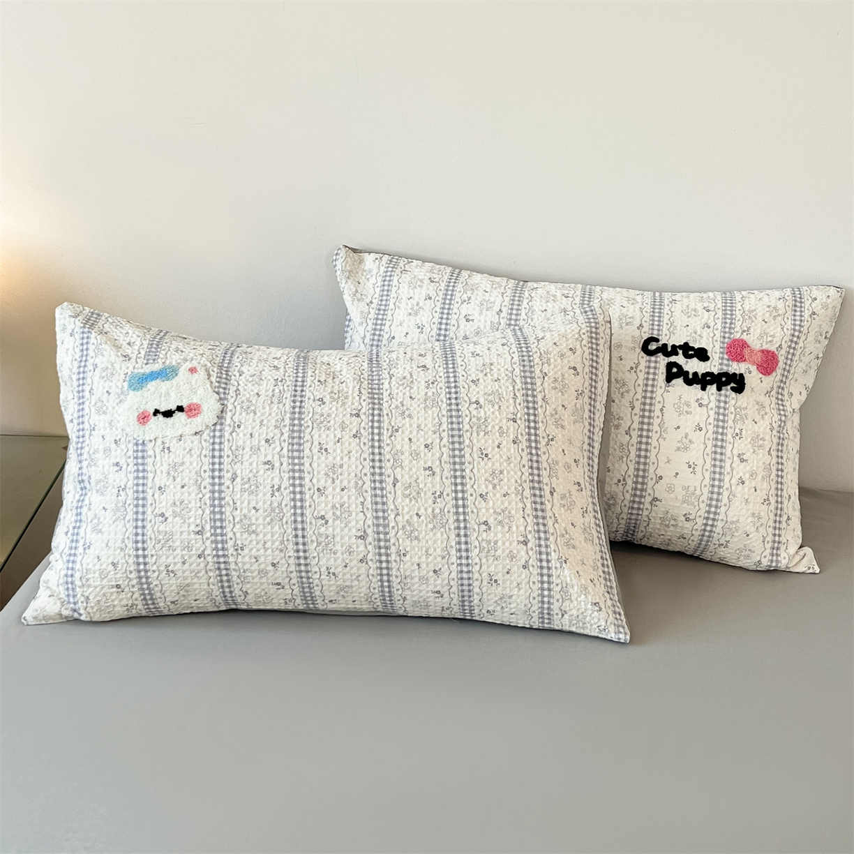 91家纺网 家纺一手货源 找家纺 笙意家纺 2026新款全棉A版华夫格B版40支毛巾绣四件套 小狗宝宝