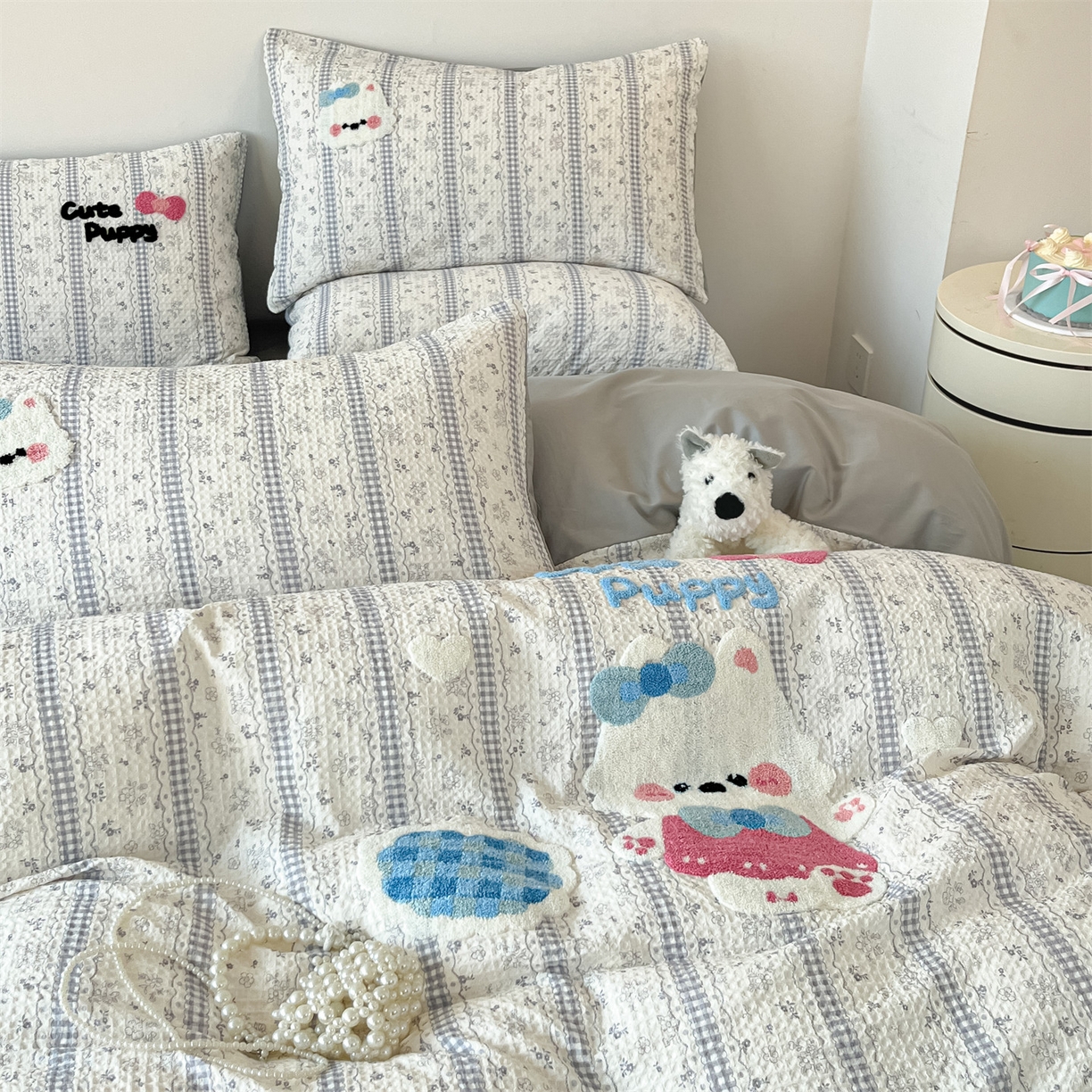 91家纺网 家纺一手货源 找家纺 笙意家纺 2026新款全棉A版华夫格B版40支毛巾绣四件套 小狗宝宝