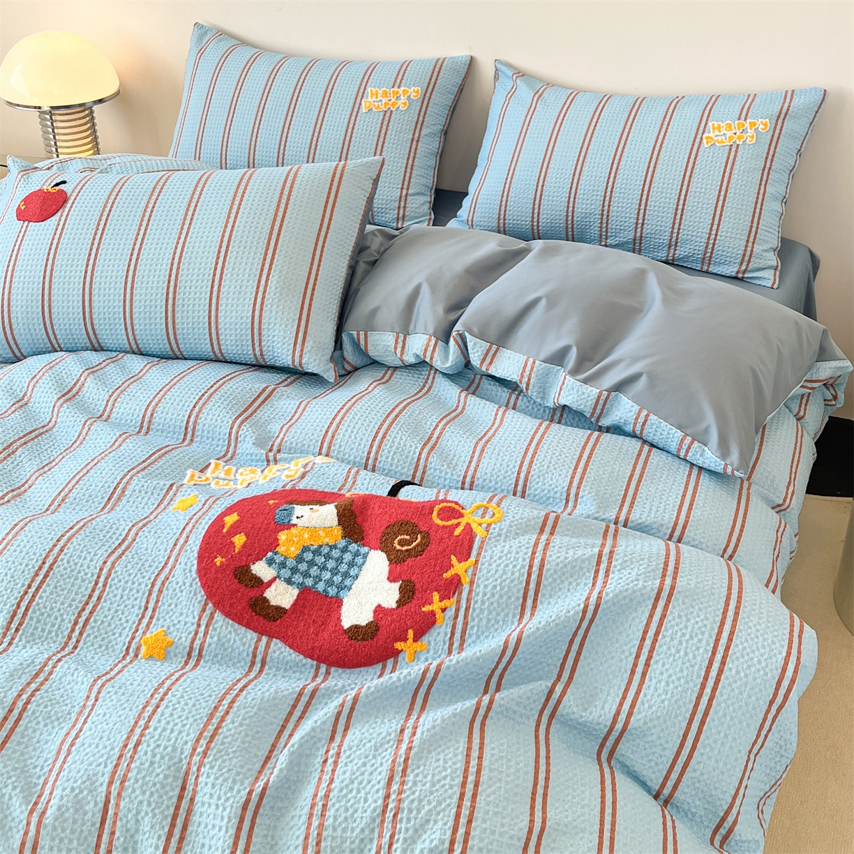 91家纺网 家纺一手货源 找家纺 笙意家纺 2026新款全棉A版华夫格B版40支毛巾绣四件套 条纹木马