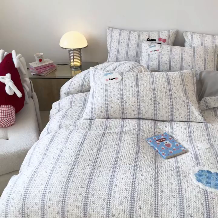 91家纺网 家纺一手货源 找家纺 笙意家纺 2026新款全棉A版华夫格B版40支毛巾绣四件套 小狗宝宝