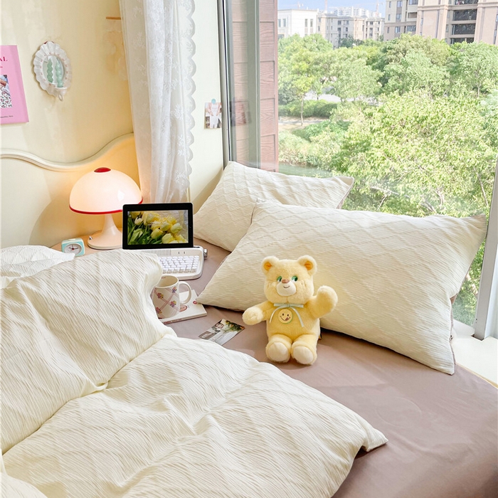 91家纺网 家纺一手货源 找家纺 琪格格纺织 2026新款纯棉色织肌理纹提花华夫格纯棉轻奢简约款四件套 泡泡纱米白奶咖